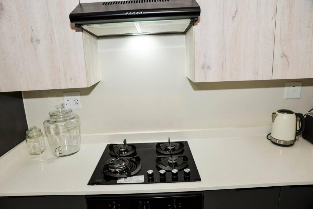 The Ellipse Palazzo Apartment Midrand Bagian luar foto