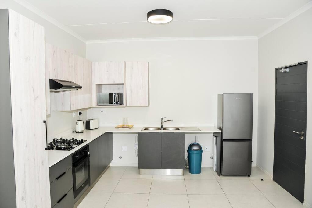 The Ellipse Palazzo Apartment Midrand Bagian luar foto